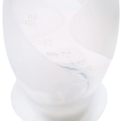 Samle opp melken som lekker mens du ammer med manuell brystpumpe/melkeoppsamler fra flow. Har tall som viser hvor mye melk du har samlet.